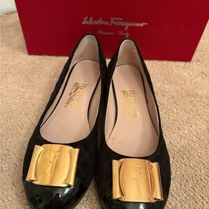 Salvatore Ferragamo Black Flats with Gold Accents